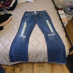 Women's Distressed Blue Jeans